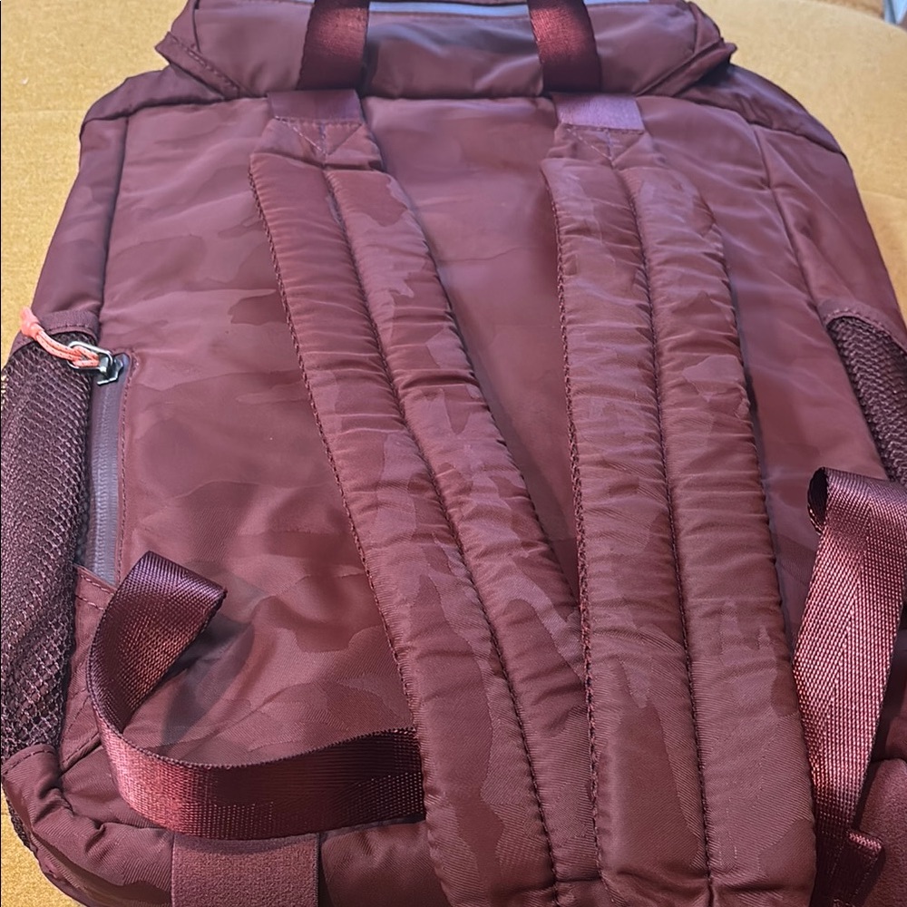 Stylish large Athleta Burgundy Backpack with zippers and padded back. - Picture 2 of 5